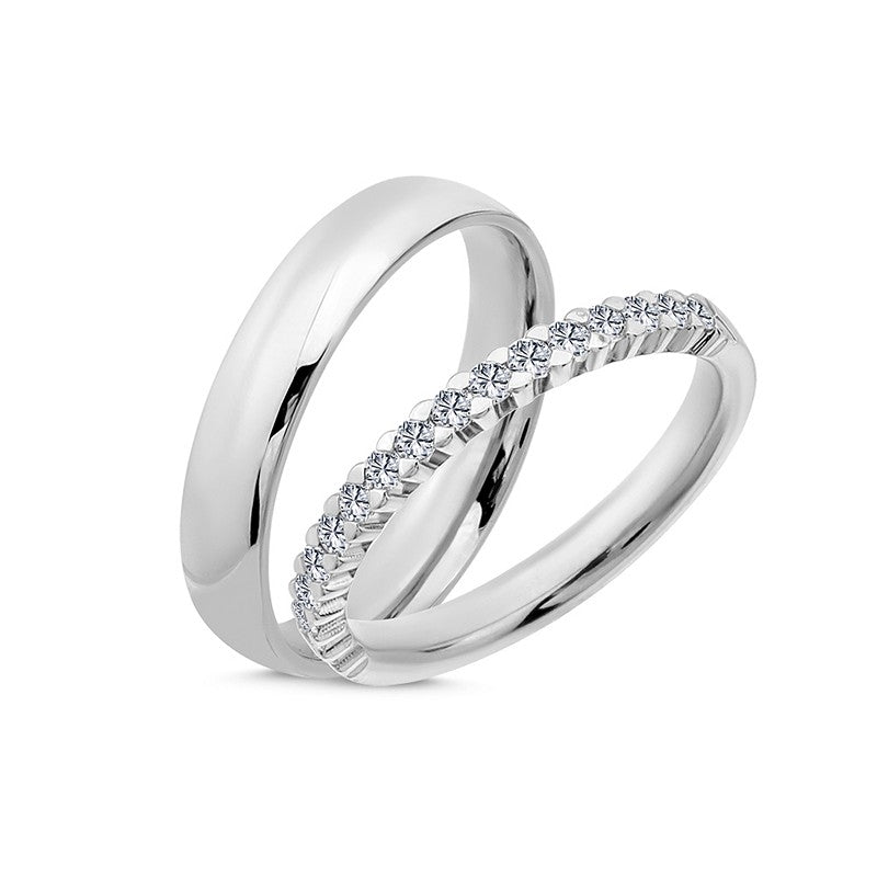 Unikke Nuran vielsesringe i 14 karat hvidguld med 0,28 ct diamanter – klassisk sæt med diamanter på damering og blank herre ring.